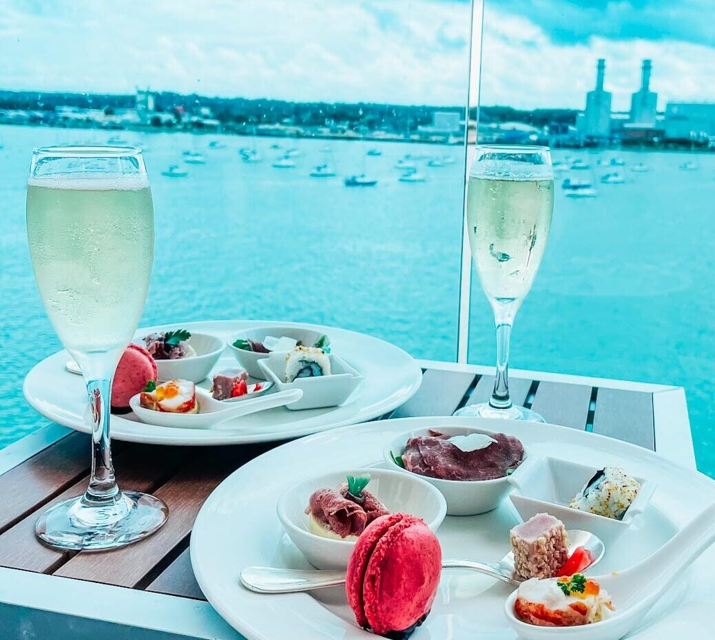 Champagne and canapes on balcony