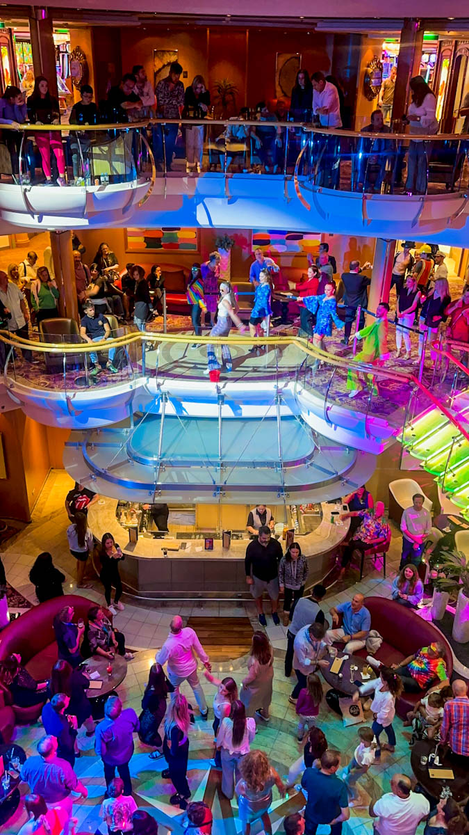 A packed atrium on a cruise ship